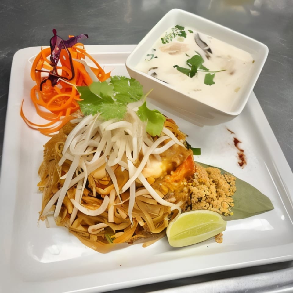 Grata Thai Cuisine's Pad Thai with shrimp, bean sprouts, lime, and a side of coconut soup.